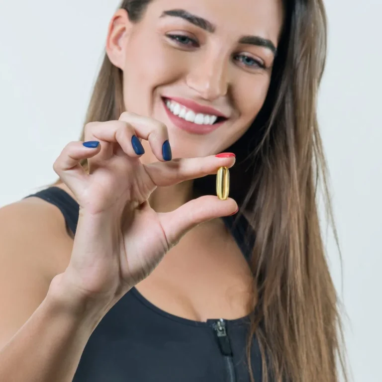 young-healthy-woman-sportswear-with-vitamin-d-e-fish-oil-omega-3-capsules-2048x1366-1